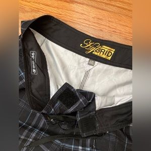 O’Neill Hybrid Shorts, size 36, Black plaid, bottle opener-hex key attached.